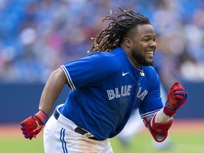 Jul 3, 2022; Toronto, Ontario, CAN; Toronto Blue Jays first baseman Vladimir Guerrero Jr. runs to first base against the Tampa Bay Rays during the ninth inning at Rogers Centre.
