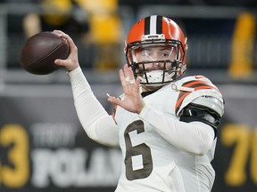 FILE - Cleveland Browns quarterback Baker Mayfield (6) warms up before an NFL football game against the Pittsburgh Steelers, on Jan. 3, 2022, in Pittsburgh. Mayfield's rocky run with Cleveland officially ended Wednesday, July 6, 2022, with the Browns trading the divisive quarterback and former No. 1 overall draft pick to the Carolina Panthers, a person familiar with the deal told the Associated Press.