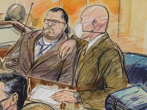 This artist sketch depicts Guy Wesley Reffitt, joined by his lawyer William Welch, right, in Federal Court, in Washington, on Feb. 28, 2022.