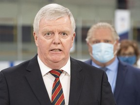 Outgoing Ontario vaccine rollout chair Rick Hillier speaks during the daily briefing at a mass vaccination centre in Toronto on Tuesday, March 30, 2021.
