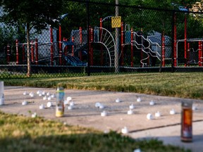 A memorial in front of a playground. A man was killed and two others were wounded near the playground while at a party on Chicago’s South Side. Demetrius Freeman/Washington Post
