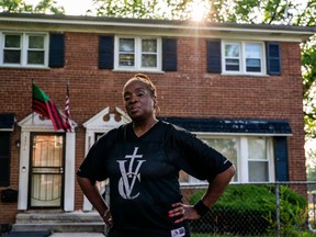 CHICAGO, ILLINOIS ‐ July 6, 2022: Bobbie Brown, 62, stands outside of her home in South Side Chicago on Wednesday, July 6, 2022. A man was killed and two others wounded while at a party on Bobbie’s block. MUST CREDIT: Washington Post photo by Demetrius Freeman.