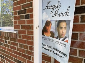 A poster honouring Joshua Yasay, 23, and Shyanne Charles, 14 -- who were killed in a mass shooting that injured 22 others during a block party at the Danzig St. housing complex in Scarborough a decade ago -- is seen outside of a townhome on Friday, July 8, 2022.