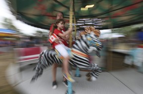 Kids enjoyed rides at the 65th annual East York Canada Day parade and day-long party at Stan Wadlow park, which was finally held after a two-year hiatus because of COVID on Friday, July 1, 2022.