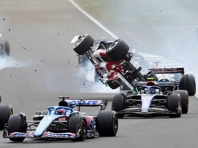 Alfa Romeo's Guanyu Zhou crashes out at the start of the British Grand Prix at the Silverstone Circuit, Silverstone, on July 3, 2022.