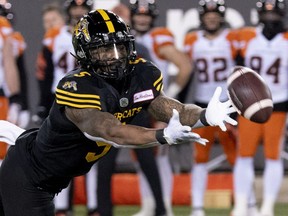 Hamilton Tiger Cats running back Don Jackson (5) can't make the catch during first half CFL football game action against the BC Lions in Hamilton, Ont. on Friday, November 5, 2021.