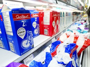 Milk and dairy products are displayed at a grocery store in Aylmer, Que., on Thursday, May 26, 2022.