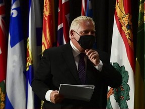 Ontario Premier Doug Ford leaves a news conference in Ottawa on Friday, September 18, 2020.