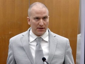 Former Minneapolis police officer Derek Chauvin addresses the court at the Hennepin County Courthouse in Minneapolis, June 25, 2021.