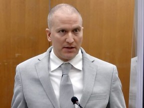 Former Minneapolis police officer Derek Chauvin addresses the court as Hennepin County Judge Peter Cahill presides over Chauvin's sentencing at the Hennepin County Courthouse in Minneapolis, June 25, 2021.