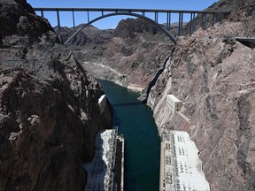 The Mike O'Callaghan-Pat Tillman Memorial Bridge crosses the Colorado River on June 28, 2022 at the Hoover Dam on the Colorado River at the Nevada and Arizona state border.