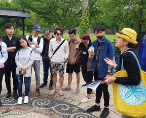 Linda Rosenbaum, who started Toronto Island Walking Tours with her business partner Susan Roy five years ago, takes a group on tour.