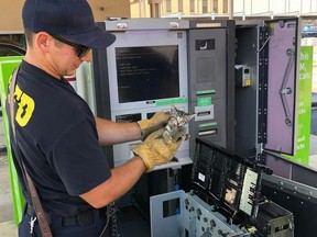 This photo from the Fort Smith Fire Department‘s Facebook page shows a firefighter holding a kitten that was stuck in an ATM machine