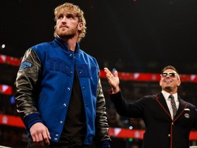 Logan Paul and The Miz are pictured at Monday Night Raw on July 18, 2022.