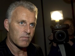 Dutch crime reporter Peter R. de Vries looks on, prior to attending a live TV show in Amsterdam, Netherlands, Thursday Jan. 31, 2008.