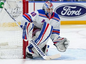 New York Rangers goaltender Alexandar Georgiev protects the net during the second period of the team's NHL hockey game against the New York Islanders on Thursday, April 21, 2022, in Elmont, N.Y.