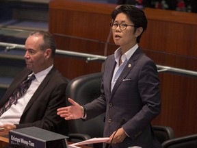 Kristyn Wong-Tam introduces a motion in the Council Chamber at Toronto City Hall, on Thursday, Sept. 13, 2018. Ontario's New Democrats are calling on the provincial government to establish a permanent 10-day paid sick leave program.