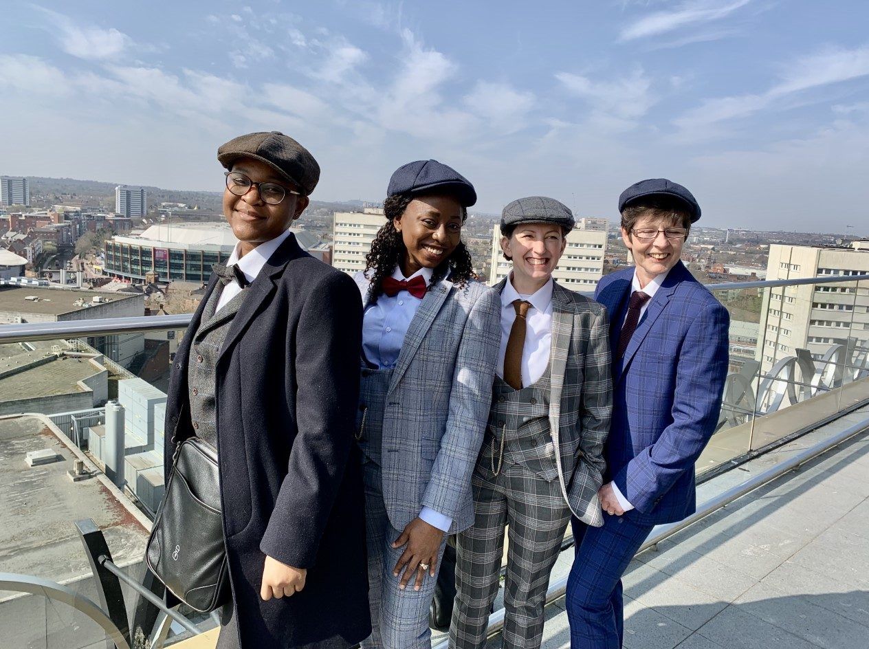 Guests will be greeted by city staff helping with this year's Commonwealth Games. These lovely ladies are dressed in famous Peaky Blinders gear