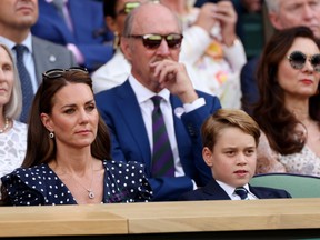 Catherine, Duchess of Cambridge and Prince George of Cambridge are seen in the Royal Box watching Novak Djokovic of Serbia play Nick Kyrgios of Australia during their Men's Singles Final match on day fourteen of The Championships Wimbledon 2022 at All England Lawn Tennis and Croquet Club on July 10, 2022 in London.