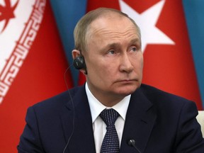 Russian President Vladimir Putin attends a news conference following a summit of leaders from the guarantor states of the Astana process, designed to find a peace settlement in the Syrian conflict, in Tehran, Iran July 19, 2022.