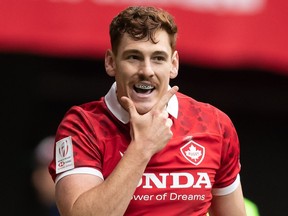 Canada's men will play Zimbabwe while the Canadian women face China in their opening matches at the Rugby World Cup Sevens in South Africa. Canada's Phil Berna celebrates after scoring a try against Germany during HSBC Canada Sevens rugby action, in Vancouver, B.C., Saturday, Sept. 18, 2021.