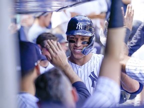 New York Yankees' Aaron Judge celebrates after hitting a two-run home run during the second inning of a baseball game against the Kansas City Royals, Saturday, July 30, 2022, in New York.
