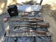 Three shotguns and boxes of ammo found in bunker in homeless encampment in California.