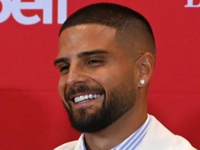 Toronto FC's new forward, Lorenzo Insigne, smiles during a press conference at BMO Field in Toronto on Monday, June 27, 2022.