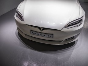 A Tesla Inc. Model S electric vehicle sits on display at a showroom in Hong Kong, China, on Friday, Nov. 23, 2018. Teslais beefing up its vehicle charging infrastructure in Hong Kong to help lure back customers after an end to the city's tax breaks caused sales to plunge.