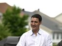 Prime Minister Justin Trudeau speaks to a family about the Climate Action Incentive Payment at their home in Ottawa on Friday, July 15, 2022.