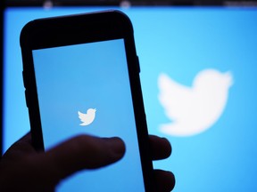 Twitter is seen on a digital device, April 25, 2022, in San Diego.