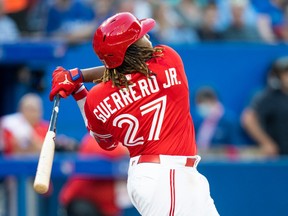 Vladimir Guerrero Jr. #27 of the Toronto Blue Jays hits a home run against the Tampa Bay Rays
