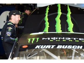 BROOKLYN, MICHIGAN - JUNE 07: Kurt Busch, driver of the #1 Monster Energy Chevrolet, gets into his car before practice for the Monster Energy NASCAR Cup Series FireKeepers Casino 400 at Michigan International Speedway on June 07, 2019 in Brooklyn, Michigan.