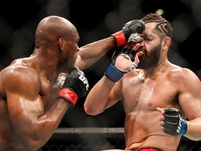Kamaru Usman of Nigeria punches Jorge Masvidal of the United States during the Welterweight Title bout of UFC 261 at VyStar Veterans Memorial Arena on April 25, 2021 in Jacksonville, Florida.