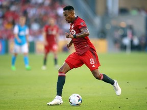 Mark-Anthony Kay of Toronto FC dribbles the ball in an MLS game against Charlotte FC at BMO Field on July 23, 2022 in Toronto, Ontario, Canada.