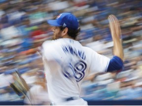 Jordan Romano of the Toronto Blue Jays pitches in the ninth inning of their MLB game against the Detroit Tigers at Rogers Centre on July 31, 2022 in Toronto, Canada.