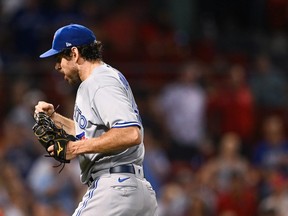 Jordan Romano of the Toronto Blue Jays reacts after beating the Boston RedSox in the tenth inning at Fenway Park on August 25, 2022 in Boston, Massachusetts.