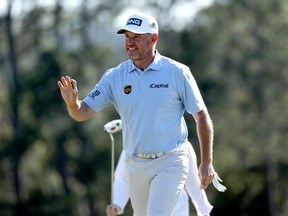Lee Westwood of England reacts after making birdie on the 18th green during the final round of the Masters at Augusta National Golf Club on April 10, 2022 in Augusta, Georgia.