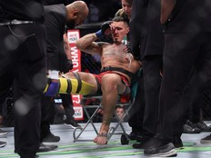 Tom Aspinall of England gets injured in the first round of his Heavyweight bout against Curtis Blaydes of USA during UFC Fight Night at O2 Arena on July 23, 2022 in London, England.