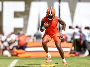 Deshaun Watson of the Cleveland Browns runs a drill during Cleveland Browns training camp at CrossCountry Mortgage Campus on July 30, 2022 in Berea, Ohio.