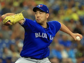 Yusei Kikuchi #16 of the Toronto Blue Jays pitches during a game against the Tampa Bay Rays at Tropicana Field on August 03, 2022 in St Petersburg, Florida.