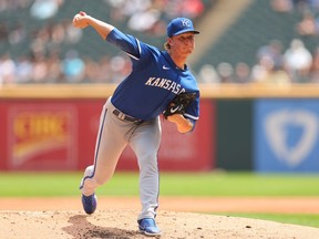 Brady Singer #51 of the Kansas City Royals delivers a pitch during the first inning against the Chicago White Sox at Guaranteed Rate Field on August 03, 2022 in Chicago, Illinois.