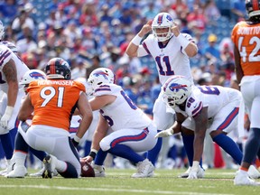 Matt Barkley #11 of the Buffalo Bills signals during the second quarter of a preseason game against the Denver Broncos at Highmark Stadium on August 20, 2022 in Orchard Park, New York.