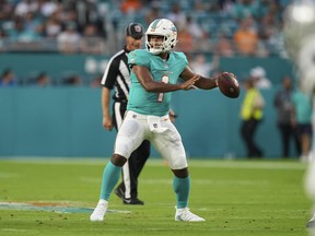 Tua Tagovailoa #1 of the Miami Dolphins attempts a pass during the first half against the Las Vegas Raiders at Hard Rock Stadium on August 20, 2022 in Miami Gardens, Florida.