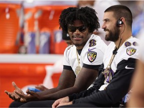 Quarterback Lamar Jackson of the Baltimore Ravens on the sidelines during the first half of the NFL preseason game against the Arizona Cardinals at State Farm Stadium on August 21, 2022 in Glendale, Arizona.