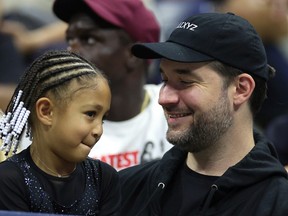 Alexis Olympia Ohanian Jr. and Alexis Ohanian, daughter and husband of Serena Williams of the United States, are seen prior to Serena's match against Danka Kovinic of Montenegro during the Women's Singles First Round on Day One of the 2022 US Open at USTA Billie Jean King National Tennis Center on August 29, 2022 in the Flushing neighborhood of the Queens borough of New York City.