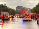 In this photo provided by @dcfireems, emergency medical crews are staged on Pennsylvania Avenue between the White House and Lafayette Park, Thursday evening, Aug. 4, 2022 in Washington. 