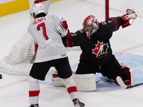 Team Canada's goaltender Dylan Garand shuts down Team Switzerland's Joel Henry during third period IIHF World Junior Championship action at Rogers Place in Edmonton, on Wednesday, Aug. 17, 2022.