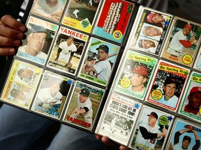 A man sells vintage baseball cards prior to the start of the last game at Yankee Stadium between the Baltimore Orioles and the New York Yankees on Sept. 21, 2008 at Yankee Stadium in the Bronx borough of New York City.