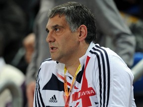 In this file photo taken on March 9, 2012 Toni Minichiello, coach of Britain's Jessica Ennis, watches Ennis compete in the women's pentathlon high jump at the 2012 IAAF World Indoor Athletics Championships at the Atakoy Athletics Arena in Istanbul.